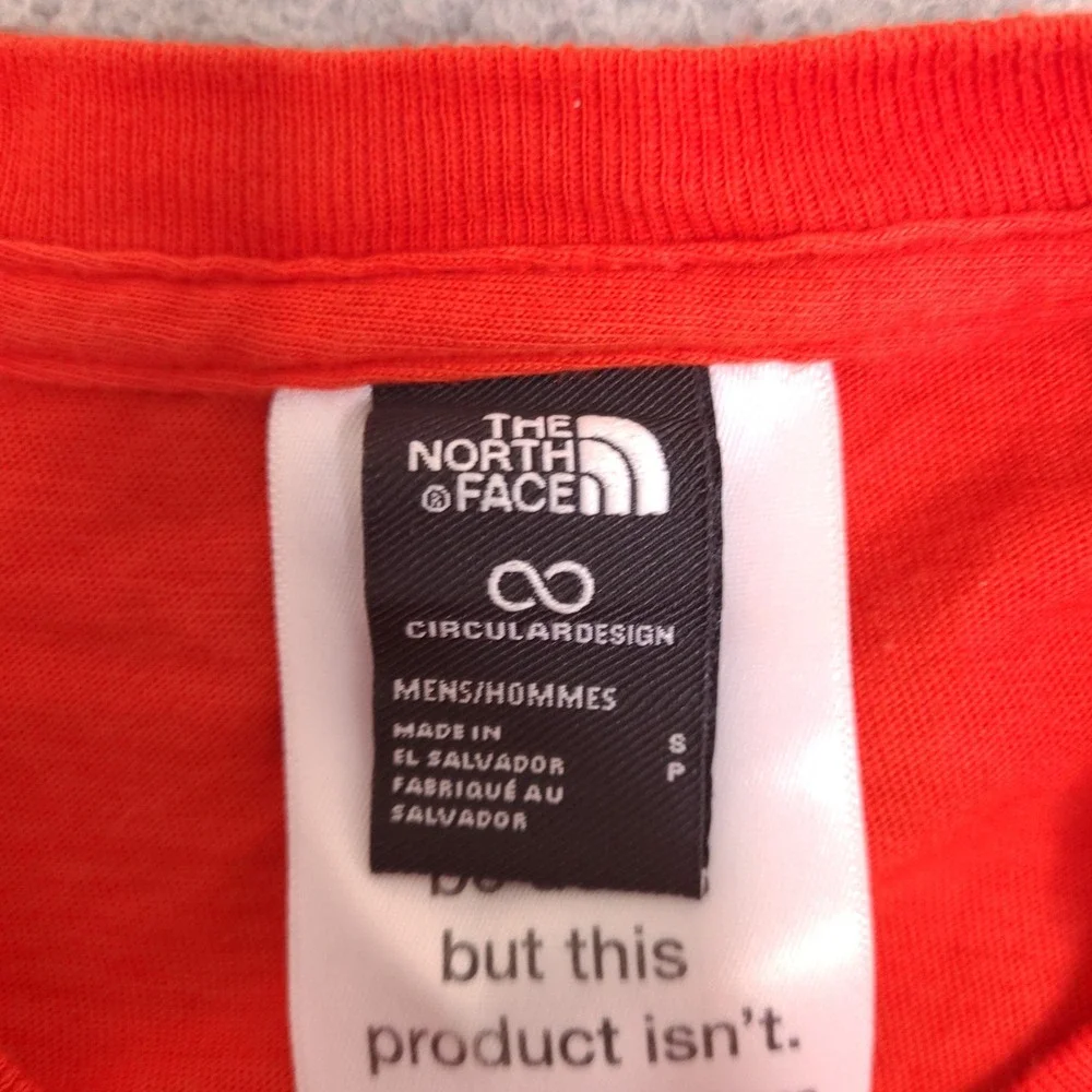 The North Face T-Shirt Mens Small Orange Circular Design Long Sleeve Graphic‎